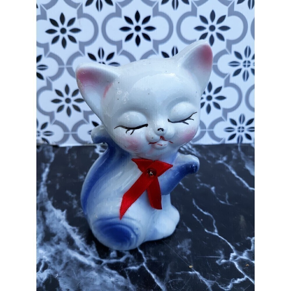 Vintage ceramic kitty with red bow tie